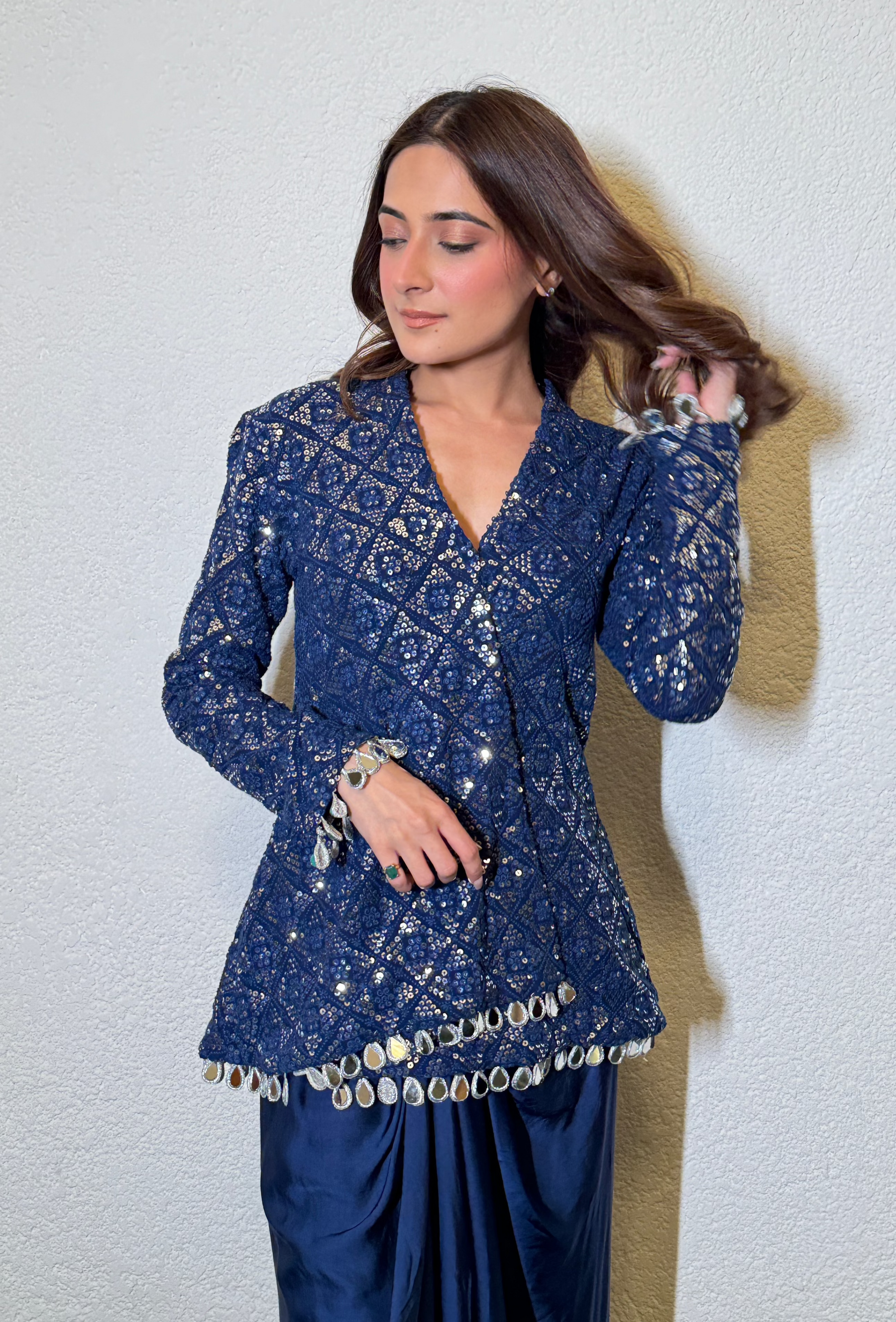 "Close-up of embroidery and mirror lacework on Chinon silk festive top"
