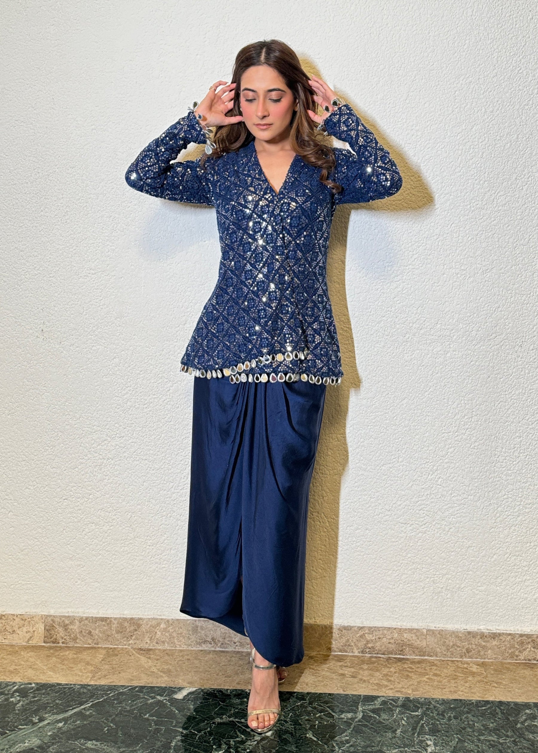 "Festive-ready Chinon Silk top featuring mirror lace and embroidered dhoti skirt"
